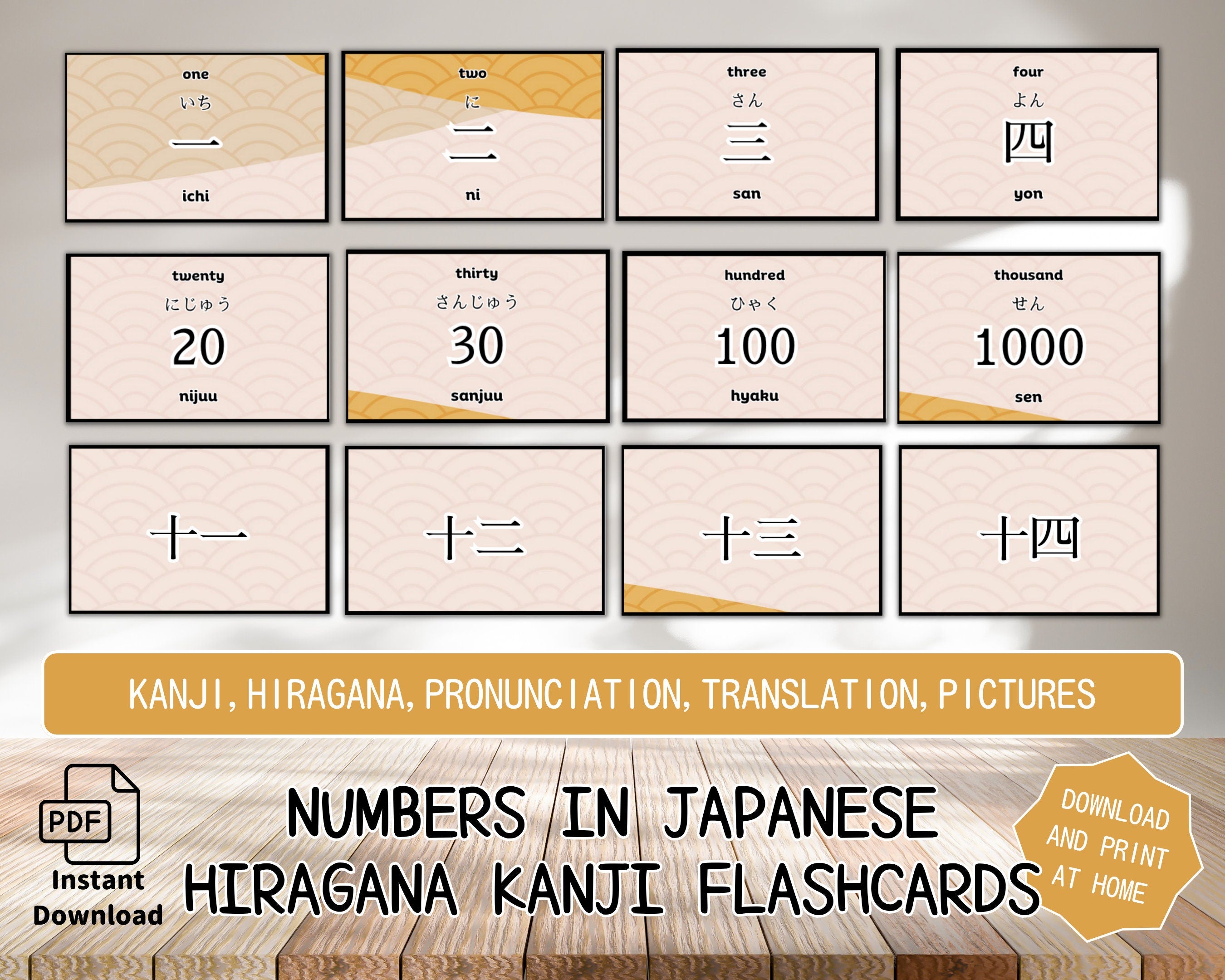 Set of Japanese Hiragana and Kanji flashcards for numbers on a wooden surface.